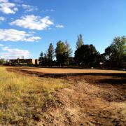Scraper moving dirt on a Santa Fe jobsite